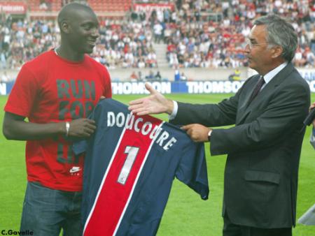 DOUCOURE ET P. BLAYAU